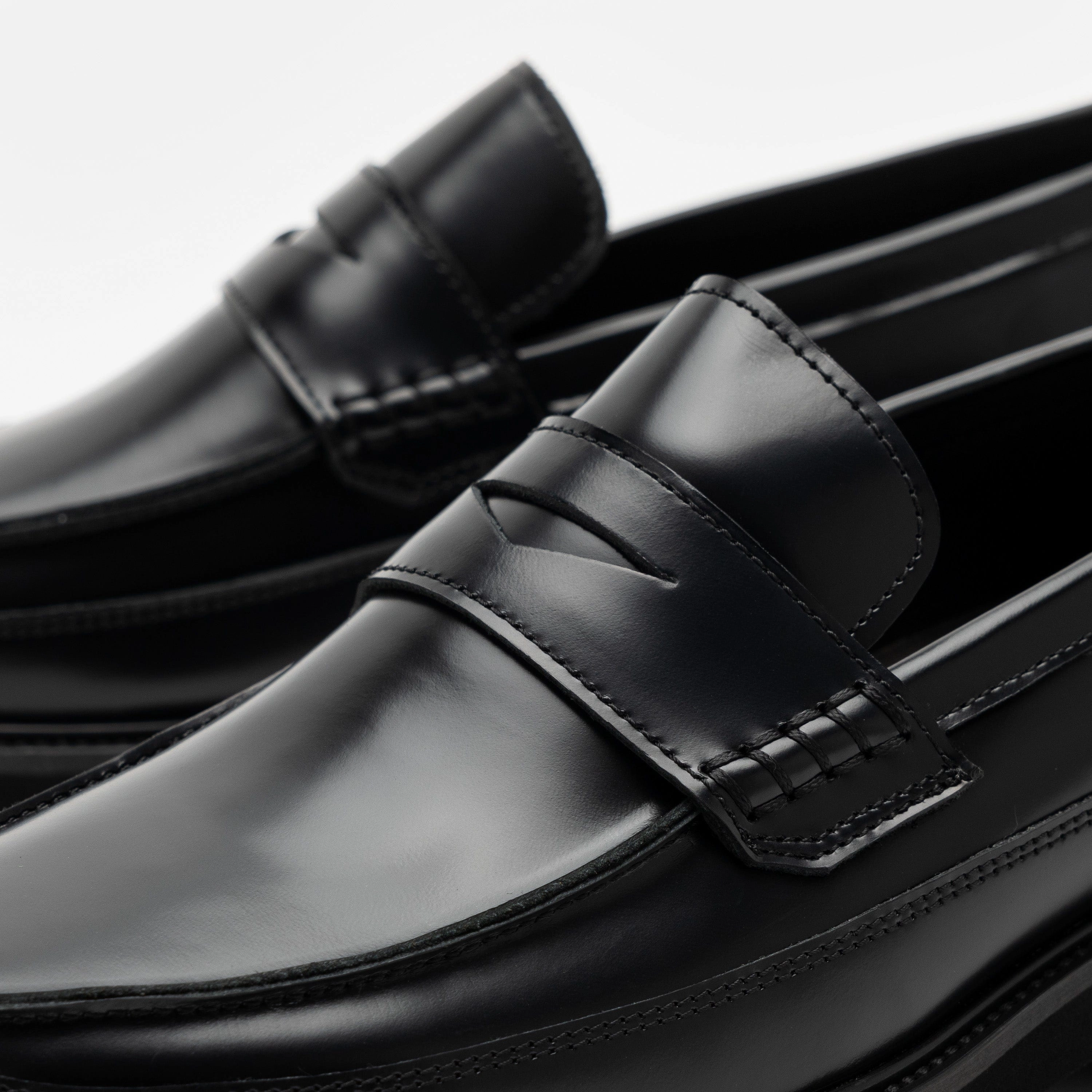 Contemporary Appeal Adler Black Leather Lug Penny Loafers