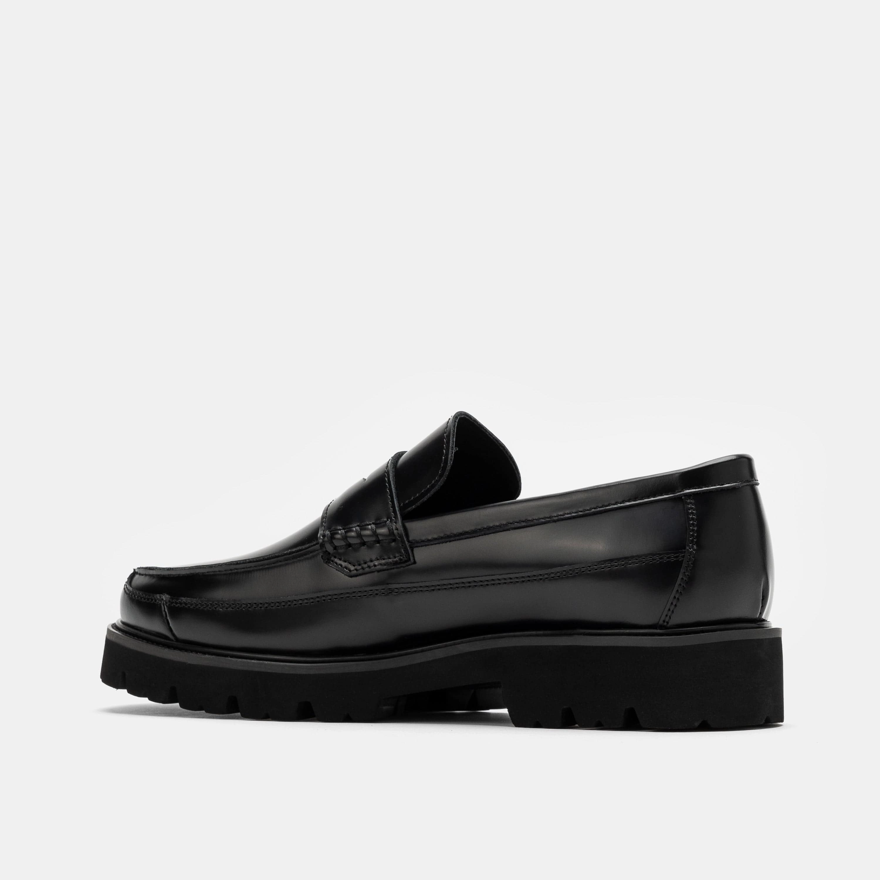 Contemporary Appeal Adler Black Leather Lug Penny Loafers