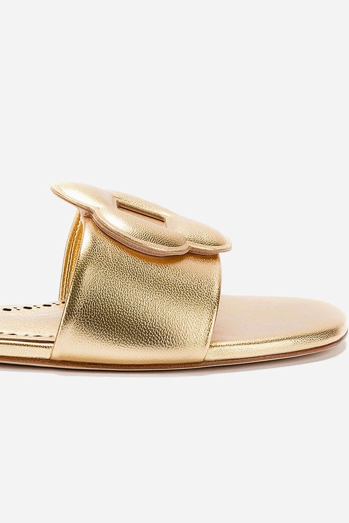 Flora Flat Mule In Gold Metallic Leather Sleek Finish