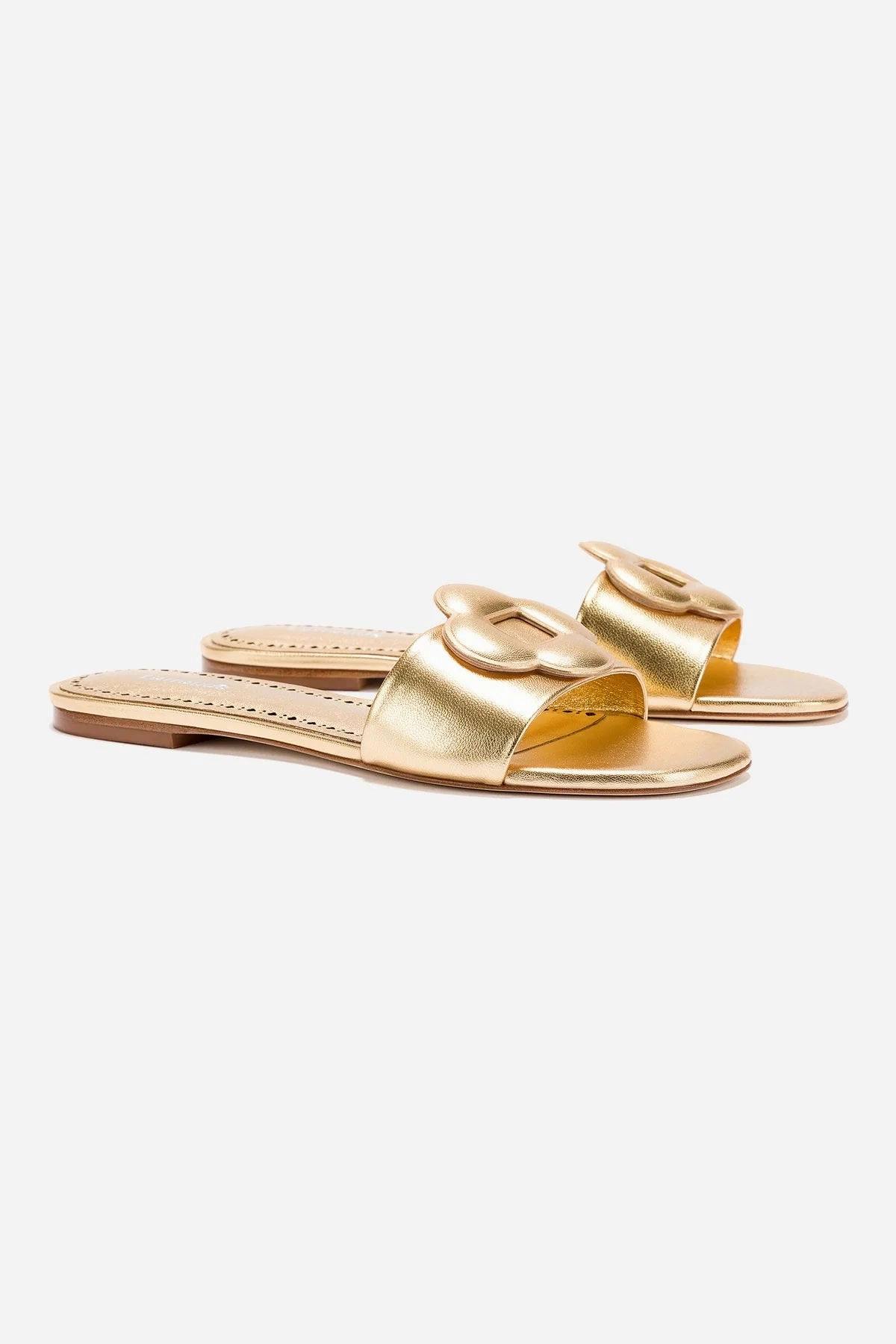 Flora Flat Mule In Gold Metallic Leather Sleek Finish