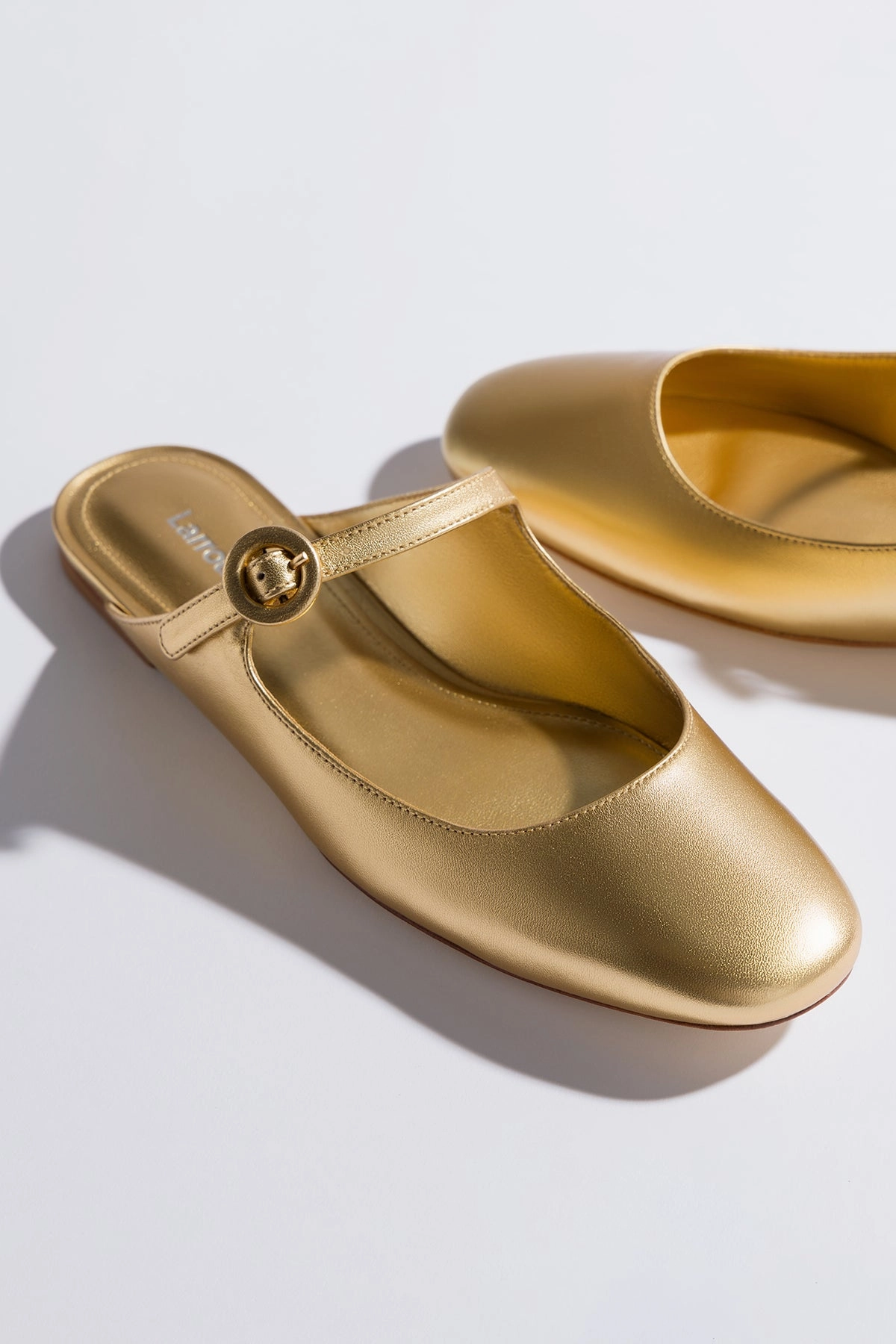 Step Soft Blair Flat Mule In Gold Metallic Leather